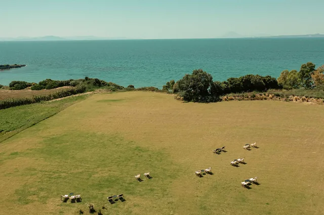 The Leventes lawn running down to the Ionian Sea, seen from above