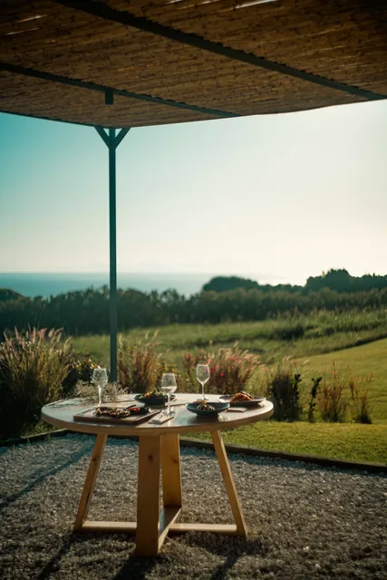 Table for two under the pergola with an uninterrupted sea view