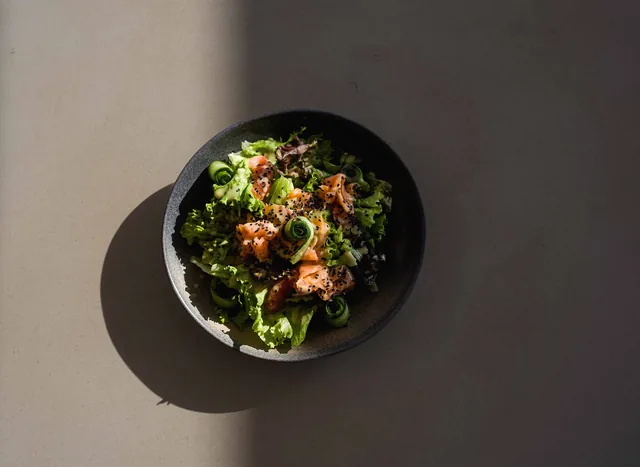 Smoked salmon salad with cucumber and black sesame